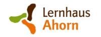 Logo des Lernhaus Ahorn in den Farben braun, orange und grün.