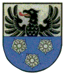 Wappen von Buch in geteiltem Schild: oben in Silber ein wachsender, rot bezungter schwarzer Adler, unten drei fünfblättrige silberne Rosen vor blauem Hintergrund